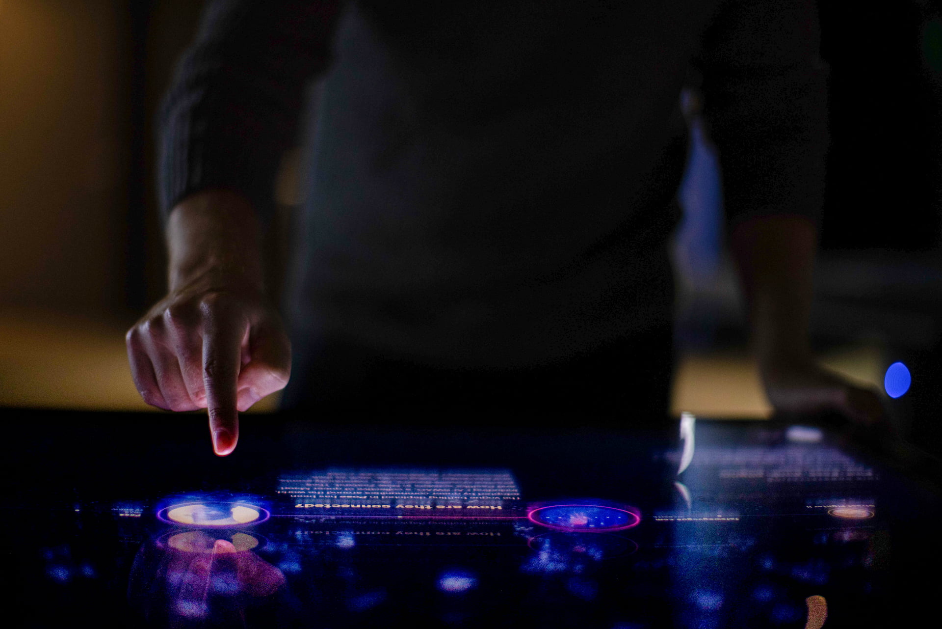 Touch table graphics Hand pressing touchscreen.