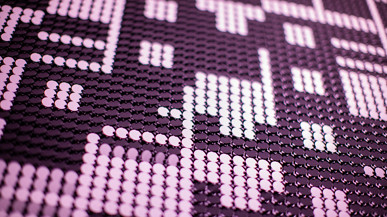 Extreme close up of rows of white flipdots mid turn.