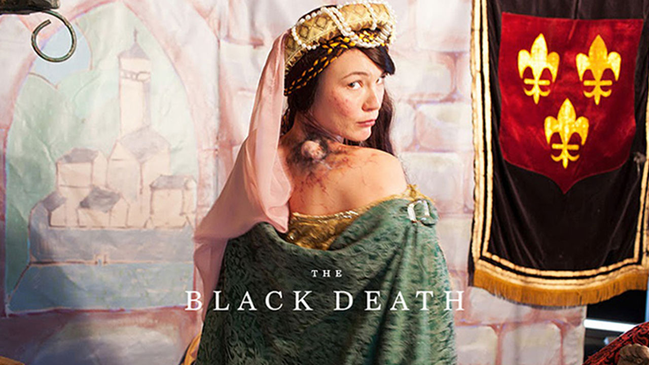 Google hangouts in history Actress in period costume on a webcam with image displayed on screen in the foreground.
