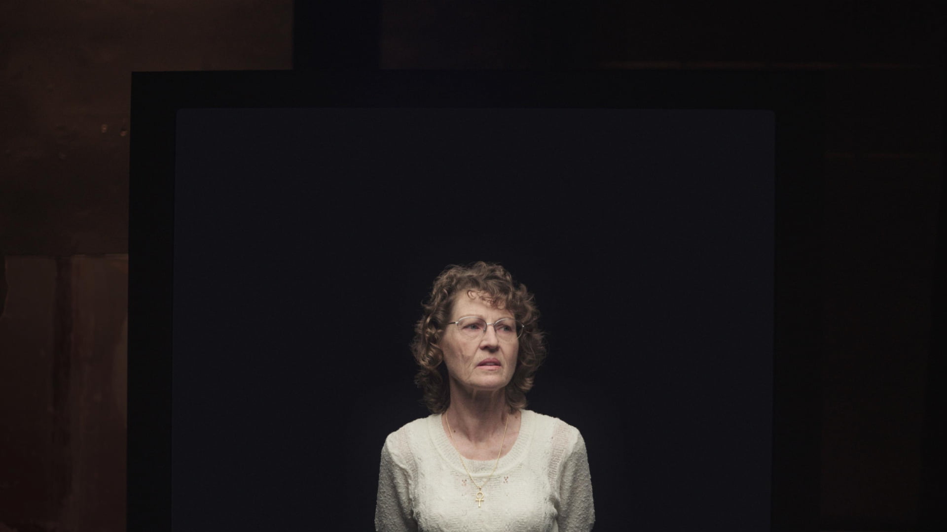 Immersive film Woman staring off-screen.
