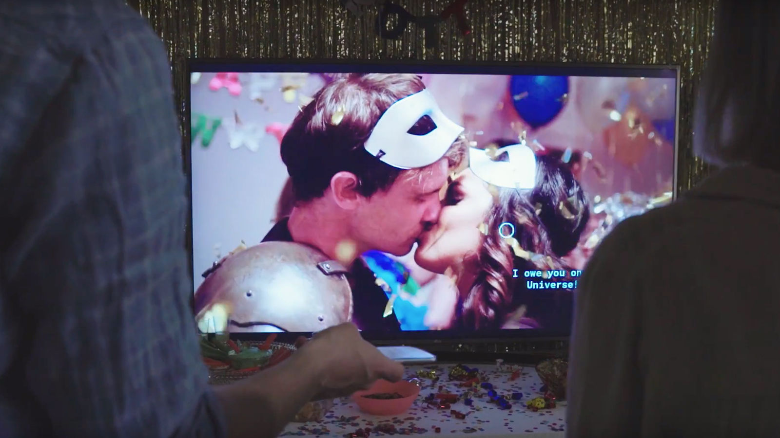 Interactive film installation A couple kiss on screen.