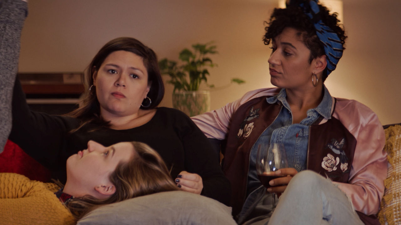 Actresses Three women sitting on a couch.