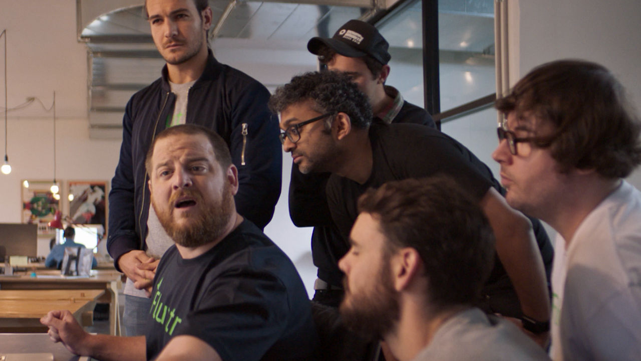 Actors Group of men looking off screen.